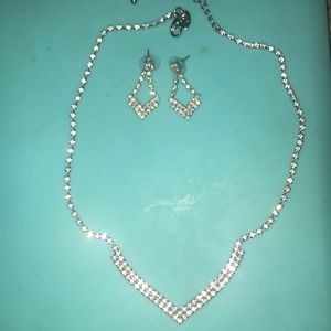 beautiful silver earrings and necklace